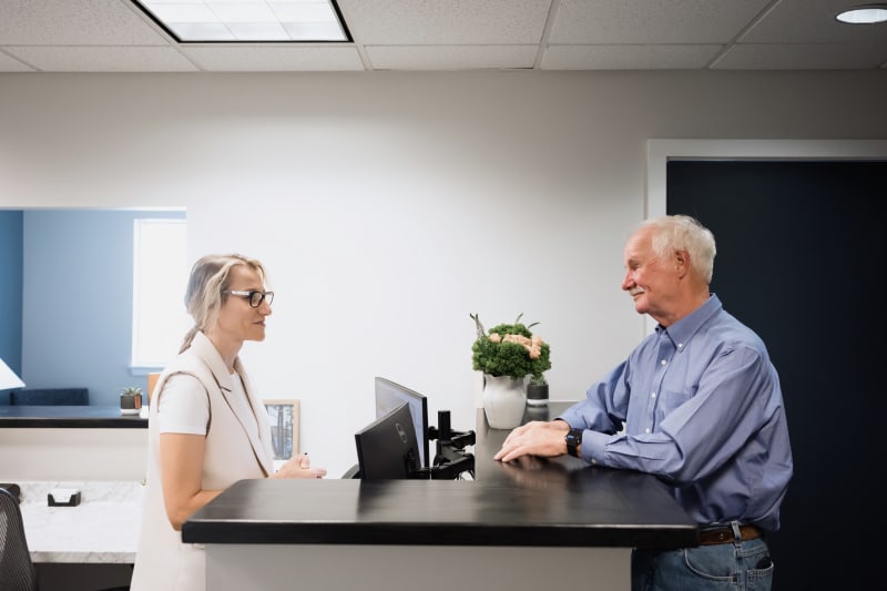 Close-up of tooth-colored filling being matched at 207 Dental