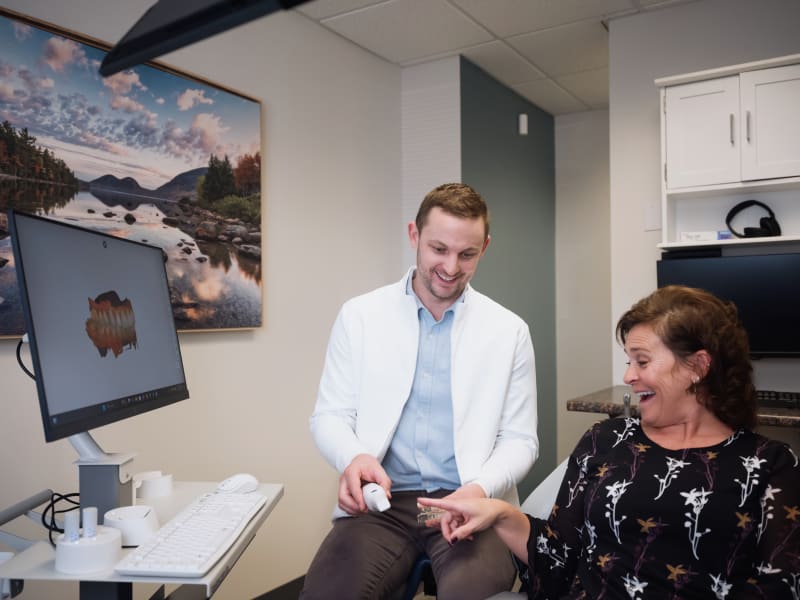 Dr. McVety discussing implant candidacy with a patient